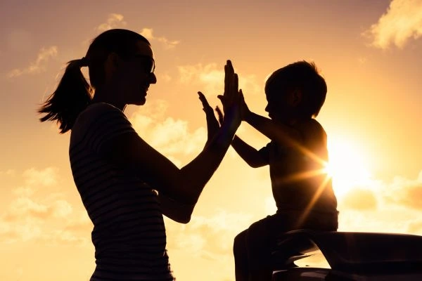 Image of happy mother and child after resolving child arrangements Leeds